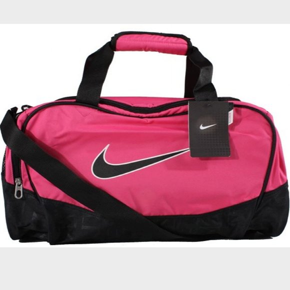 nike brasilia medium holdall pink